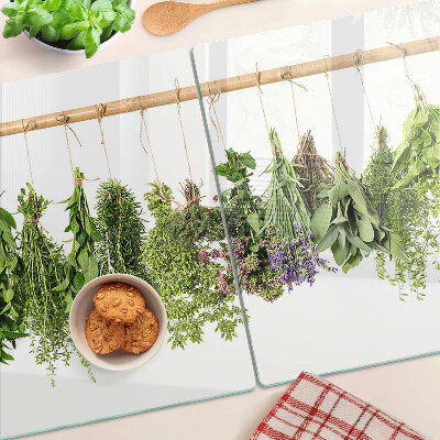 Schneidebrett glas Getrocknete Kräuter an einer Schnur