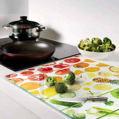 Schneidebrett Glas mit einem Motiv aus Obst und Gemüse in Regenbogenfarben