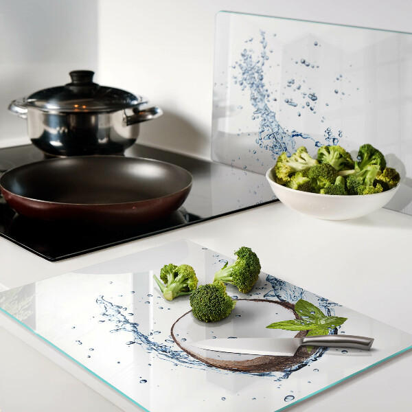 Glas Schneidebrett mit Kokosnussmotiv sowie Wasser- und Minzdekoration