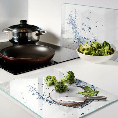 Glas Schneidebrett mit Kokosnussmotiv sowie Wasser- und Minzdekoration