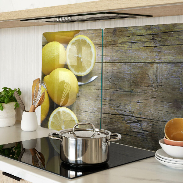 Schneidebrett mit Motiv aus Zitronen auf Holzgrund