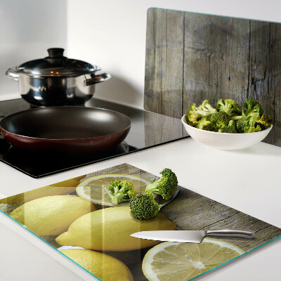 Schneidebrett mit Motiv aus Zitronen auf Holzgrund