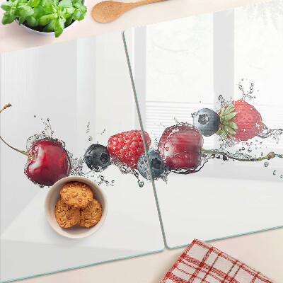 Schneidebrett mit Motiv von Früchten im Wasser