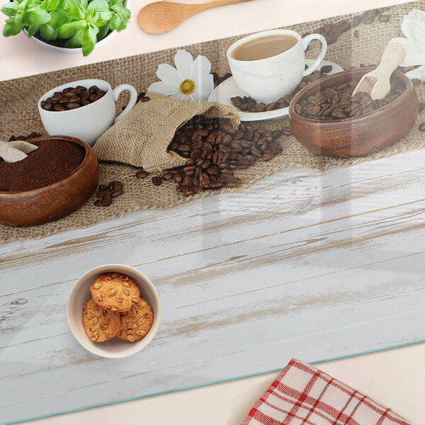 Schneidebrett Kaffee und Kaffeebohnen