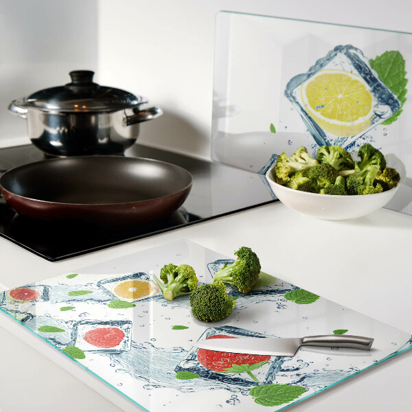 Glas-Schneidebrett mit Fruchtmotiv aus bunten Scheiben