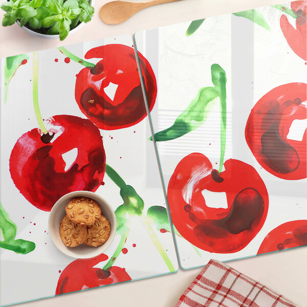 Schneidebrett glas Rote Kirschen auf weißem Hintergrund