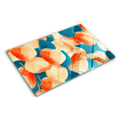 Schneidebrett Glas mit einem Motiv von Pfirsichen vor einem Blätterhintergrund