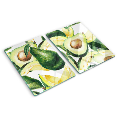 Glas schneidebrett Avocado mit Blättern im Hintergrund