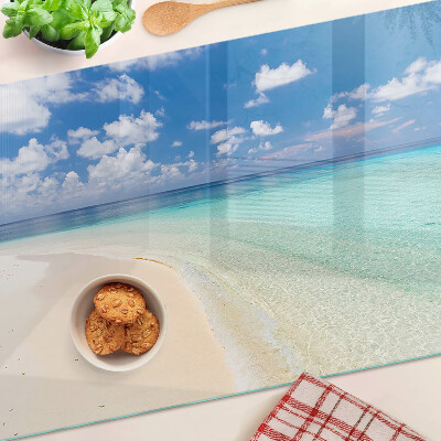 Glas schneidebrett Strand mit blauem Himmel
