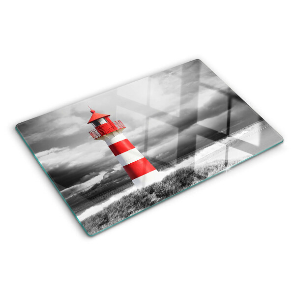 Schneidebrett Glas mit Motiv eines Leuchtturms in einer Landschaft