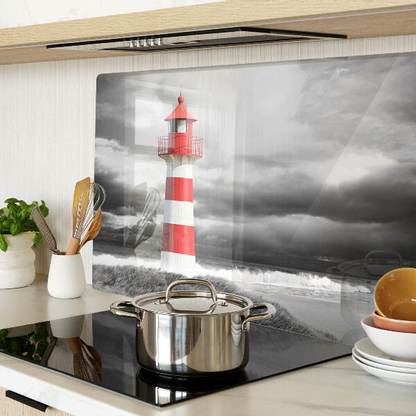 Schneidebrett Glas mit Motiv eines Leuchtturms in einer Landschaft