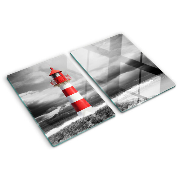 Schneidebrett Glas mit Motiv eines Leuchtturms in einer Landschaft