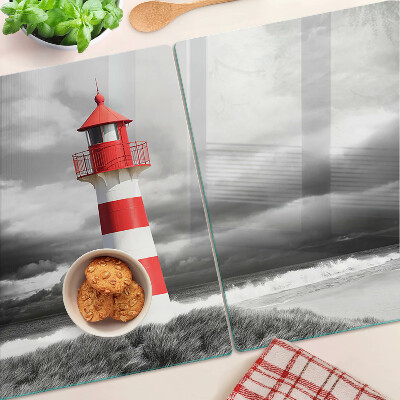 Schneidebrett Glas mit Motiv eines Leuchtturms in einer Landschaft