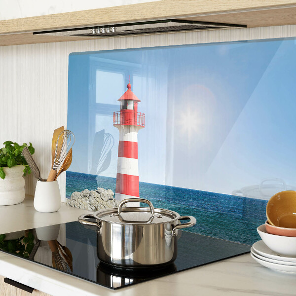 Glas-Schneidebrett mit Motiv eines Leuchtturms über dem Meer