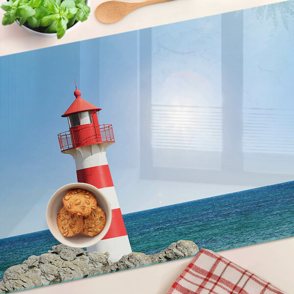 Glas schneidebrett Ein Leuchtturm über dem Meer