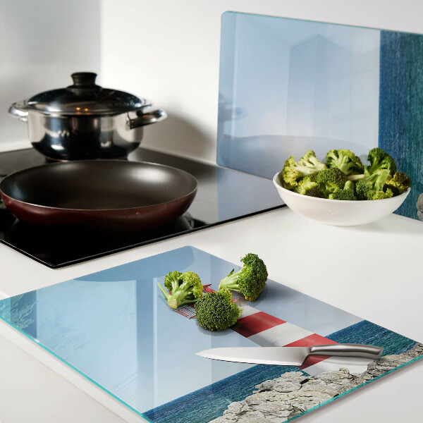 Glas schneidebrett Ein Leuchtturm über dem Meer