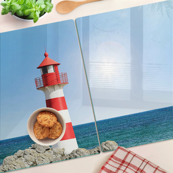 Glas schneidebrett Ein Leuchtturm über dem Meer