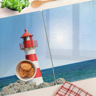 Glas schneidebrett Ein Leuchtturm über dem Meer