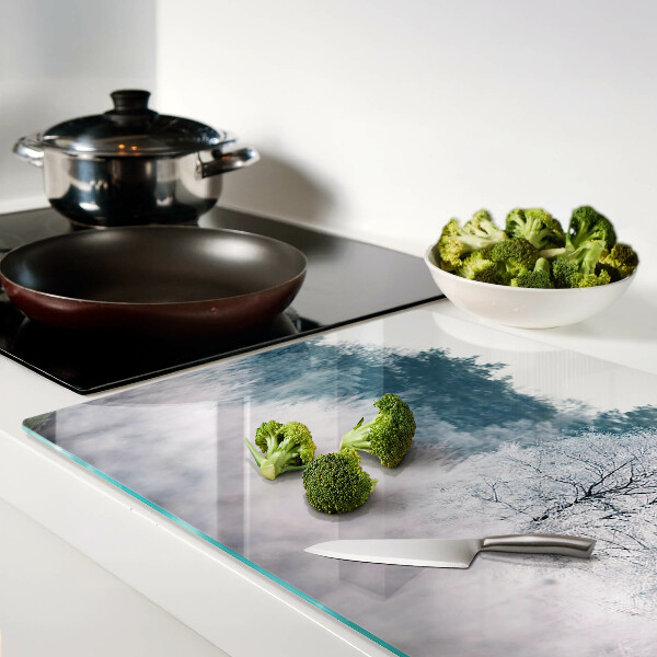 Schneidebrett Glas mit Winterlandschaft und Bäumen