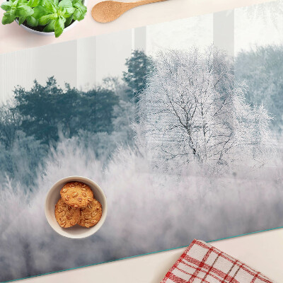 Schneidebrett Glas mit Winterlandschaft und Bäumen