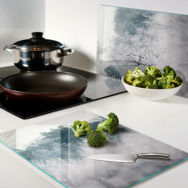 Schneidebrett Glas mit Winterlandschaft und Bäumen