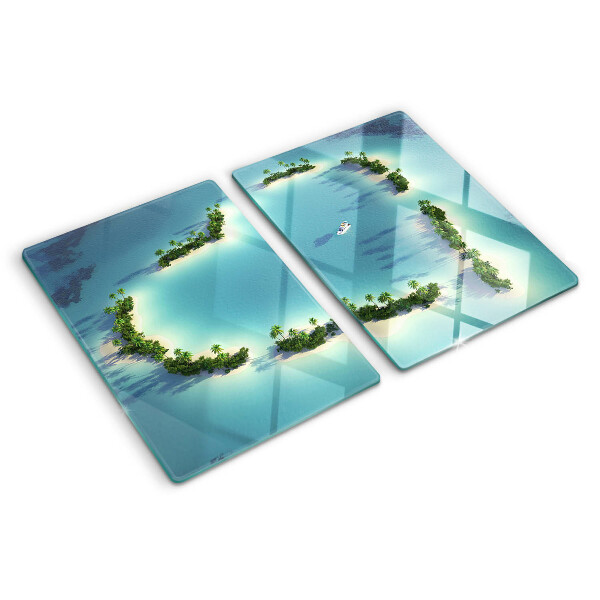 Glas-Schneidebrett mit einem Motiv einer paradiesischen Insel und Palmen