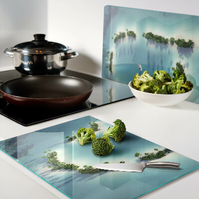 Glas-Schneidebrett mit einem Motiv einer paradiesischen Insel und Palmen