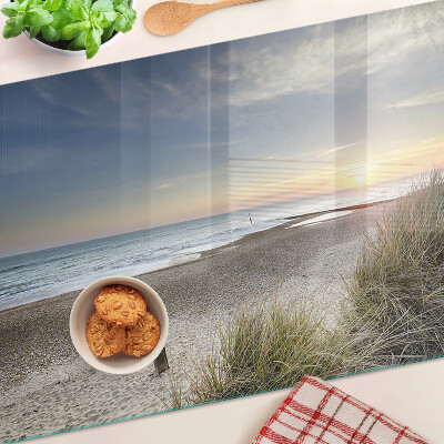 Schneidebrett mit Motiv eines Strandes bei Sonnenuntergang