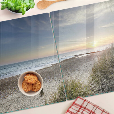Schneidebrett mit Motiv eines Strandes bei Sonnenuntergang