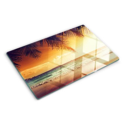 Glas schneidebrett Sonnenuntergang über dem Strand