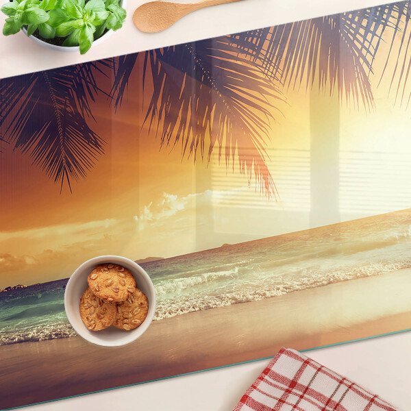 Glas-Schneidebrett mit Motiv „Sonnenuntergang über dem Strand“