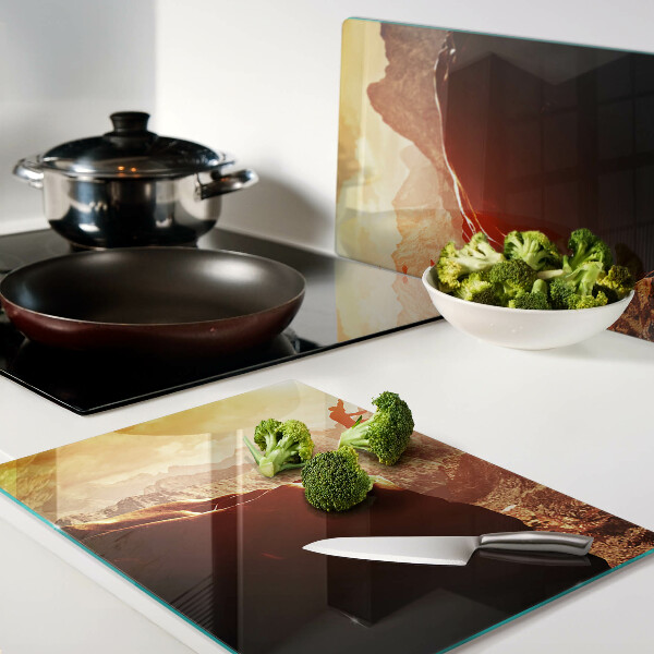 Schneidebrett Glas mit Motiv „Springen in den Bergen bei Sonnenuntergang“