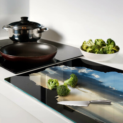 Glas schneidebrett Sonnenuntergang hinter den Wolken