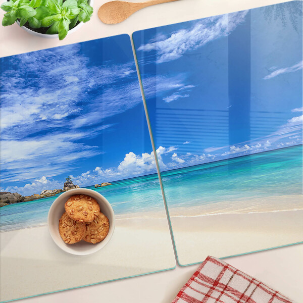 Schneidebrett mit Motiv eines tropischen Strandes und blauem Himmel