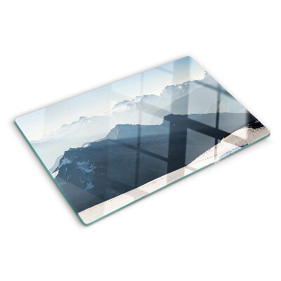 Glas-Schneidebrett mit Motiv einer Berglandschaft in den Wolken