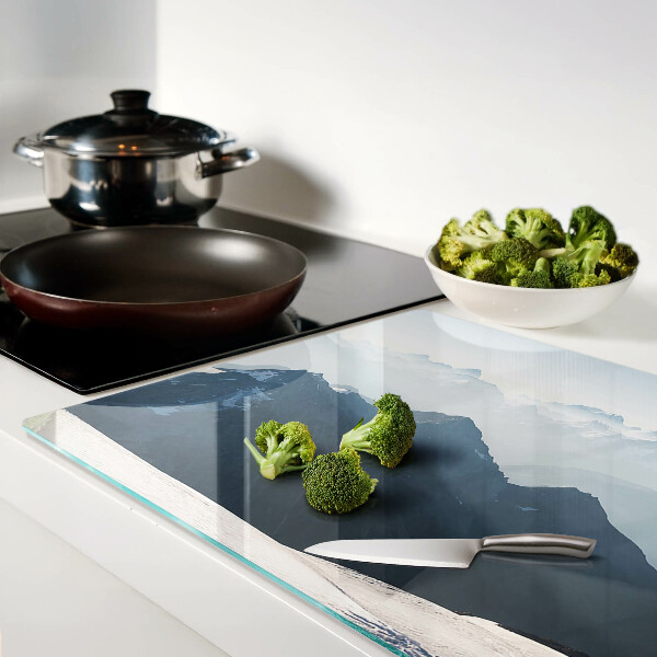 Glas-Schneidebrett mit Motiv einer Berglandschaft in den Wolken