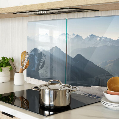 Glas-Schneidebrett mit Motiv einer Berglandschaft in den Wolken
