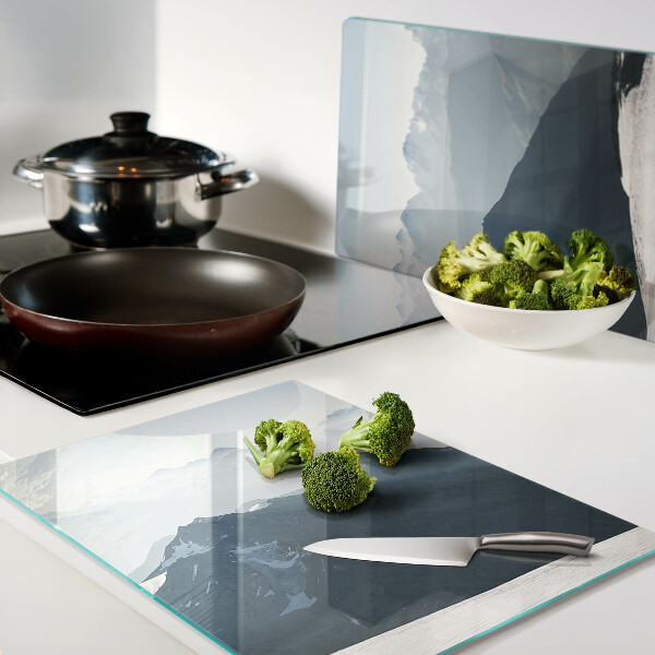 Glas-Schneidebrett mit Motiv einer Berglandschaft in den Wolken