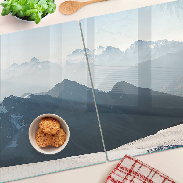 Glas-Schneidebrett mit Motiv einer Berglandschaft in den Wolken