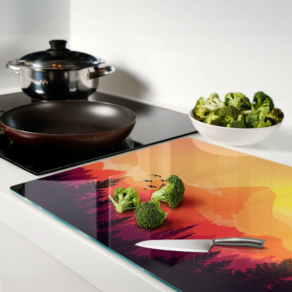 Glas schneidebrett Berglandschaft bei Sonnenuntergang