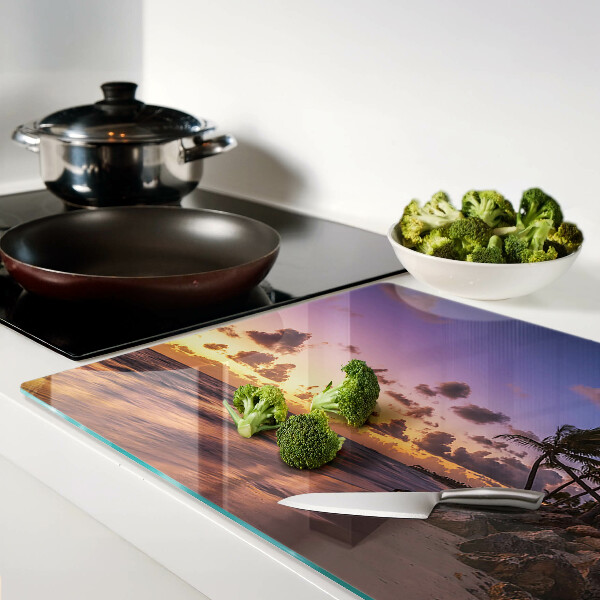 Schneidebrett Sonnenuntergang über dem Strand