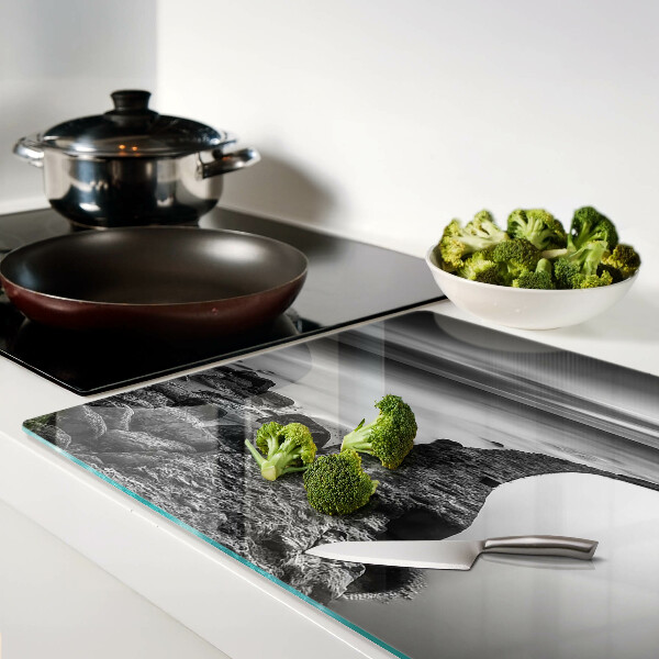 Schneidebrett Glas mit einer Küstenlandschaft in Grautönen