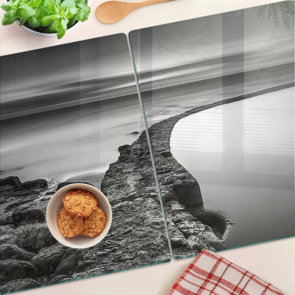 Schneidebrett Glas mit einer Küstenlandschaft in Grautönen