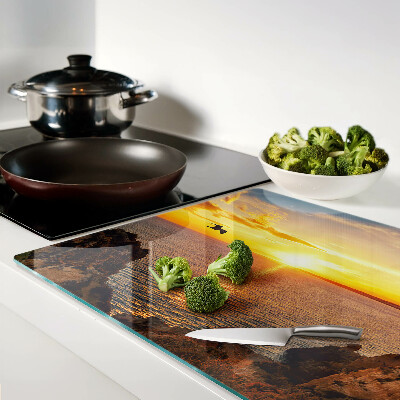 Glas schneidebrett Sonnenuntergang über dem Meer