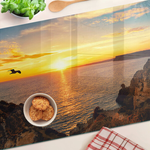 Glas schneidebrett Sonnenuntergang über dem Meer