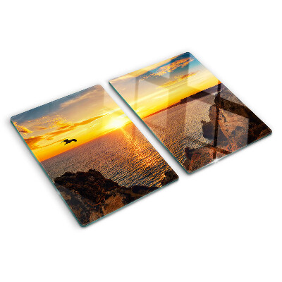 Glas schneidebrett Sonnenuntergang über dem Meer