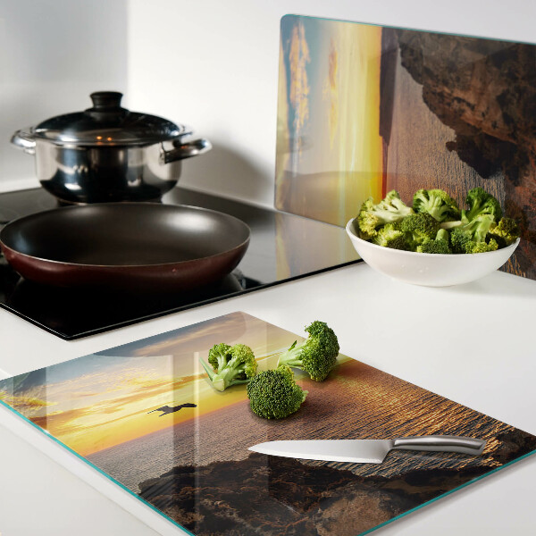 Glas schneidebrett Sonnenuntergang über dem Meer