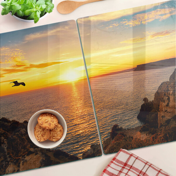 Glas-Schneidebrett mit Motiv 'Sonnenuntergang über dem Meer'