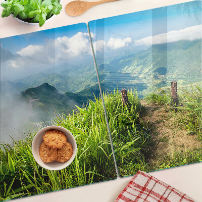 Schneidebrett Glas mit Berglandschaft und viel Grün