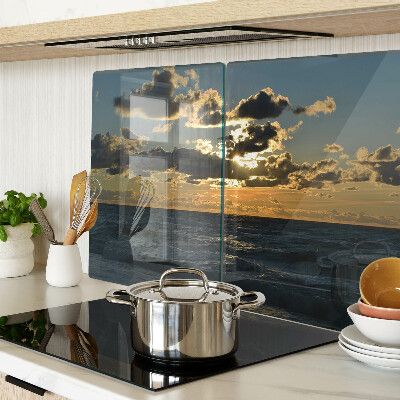 Glas schneidebrett Sonnenuntergang über dem Meer